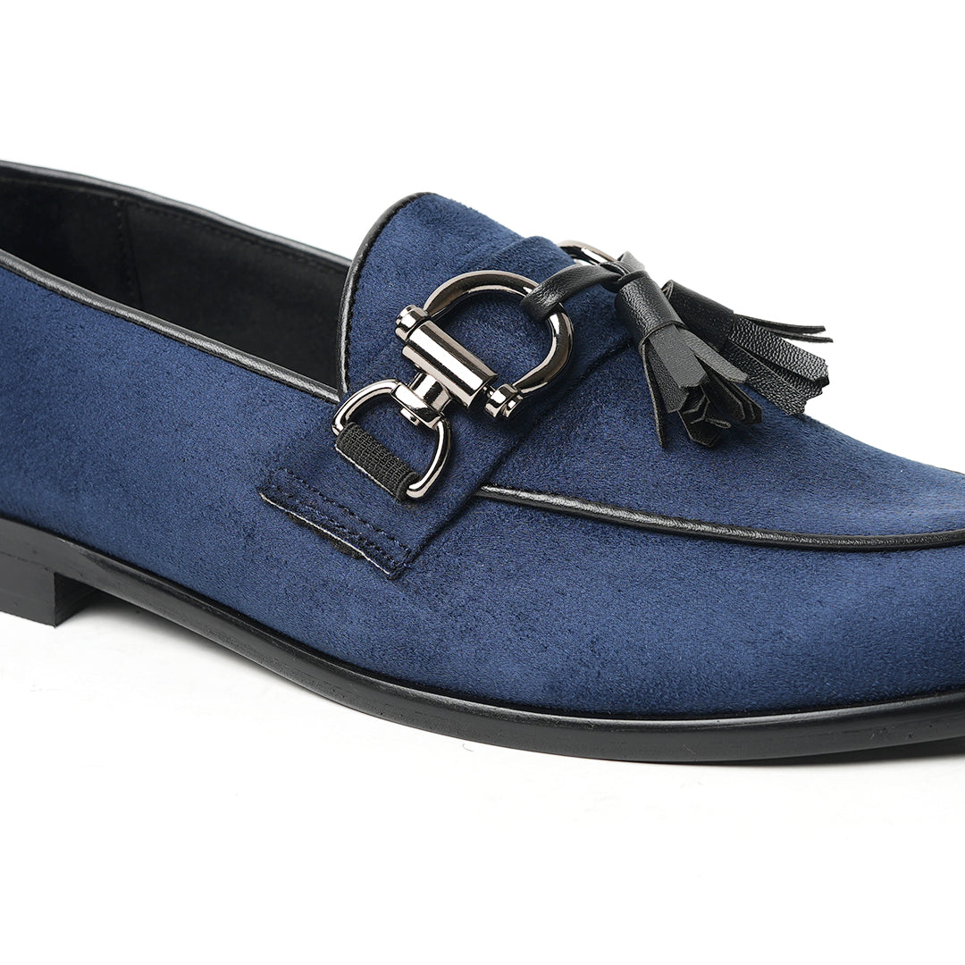 A classic Monkstory Horse-bit Tasseled Slip-Ons blue loafer exuding modern sophistication.