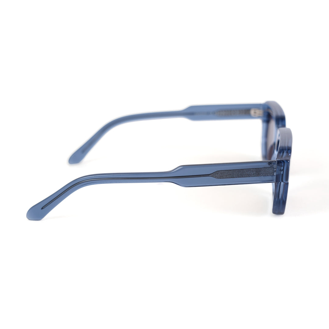 A pair of monkstory geometric acetate unisex sunglasses in transparent blue with brown lenses offering UV 400 protection.