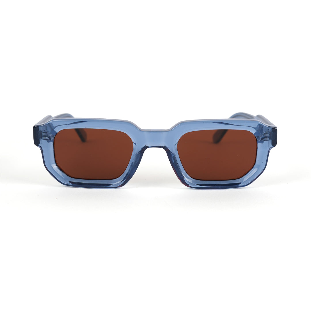 A pair of monkstory geometric acetate unisex sunglasses in transparent blue with brown lenses offering UV 400 protection.
