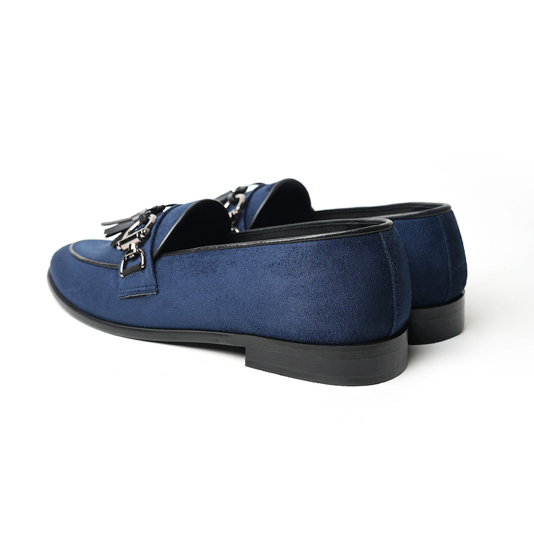 A classic Monkstory Horse-bit Tasseled Slip-Ons blue loafer exuding modern sophistication.