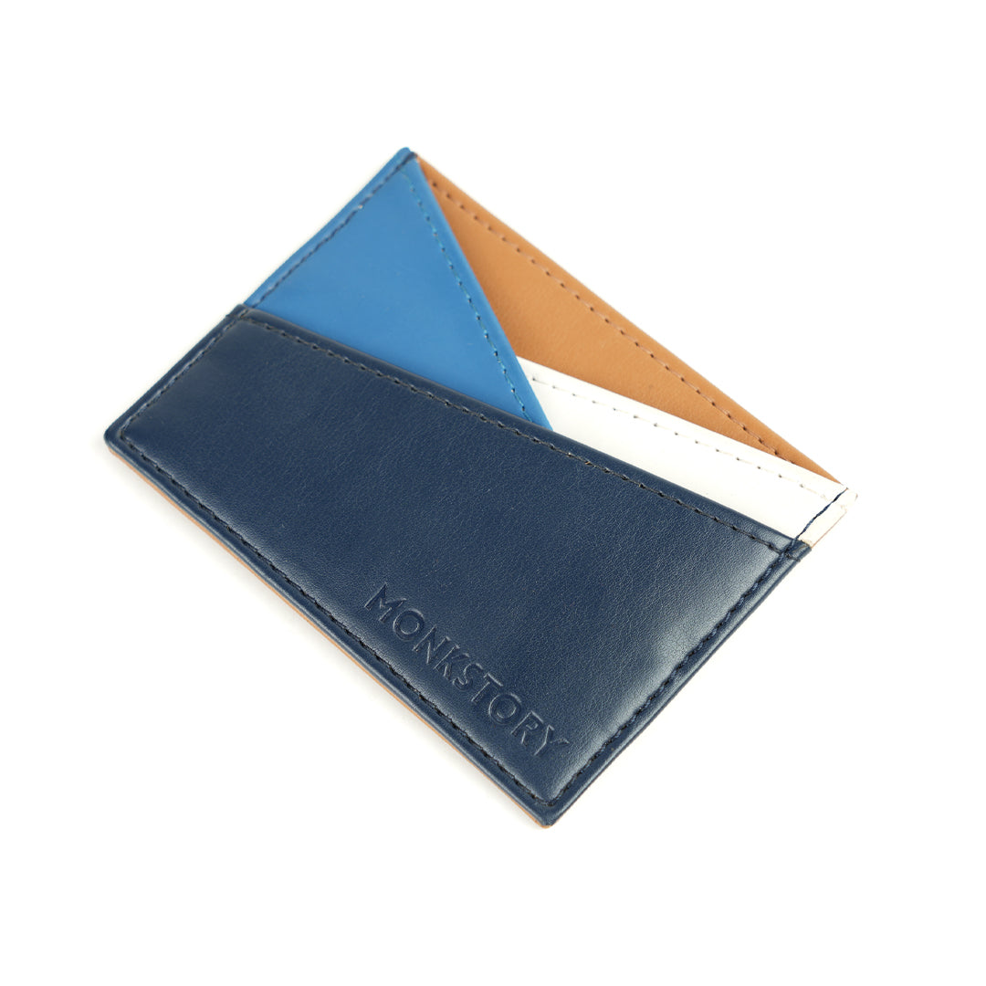 A blue and tan Monkstory Slim Colorblock Card Holder - Blue PU leather by monkstory.