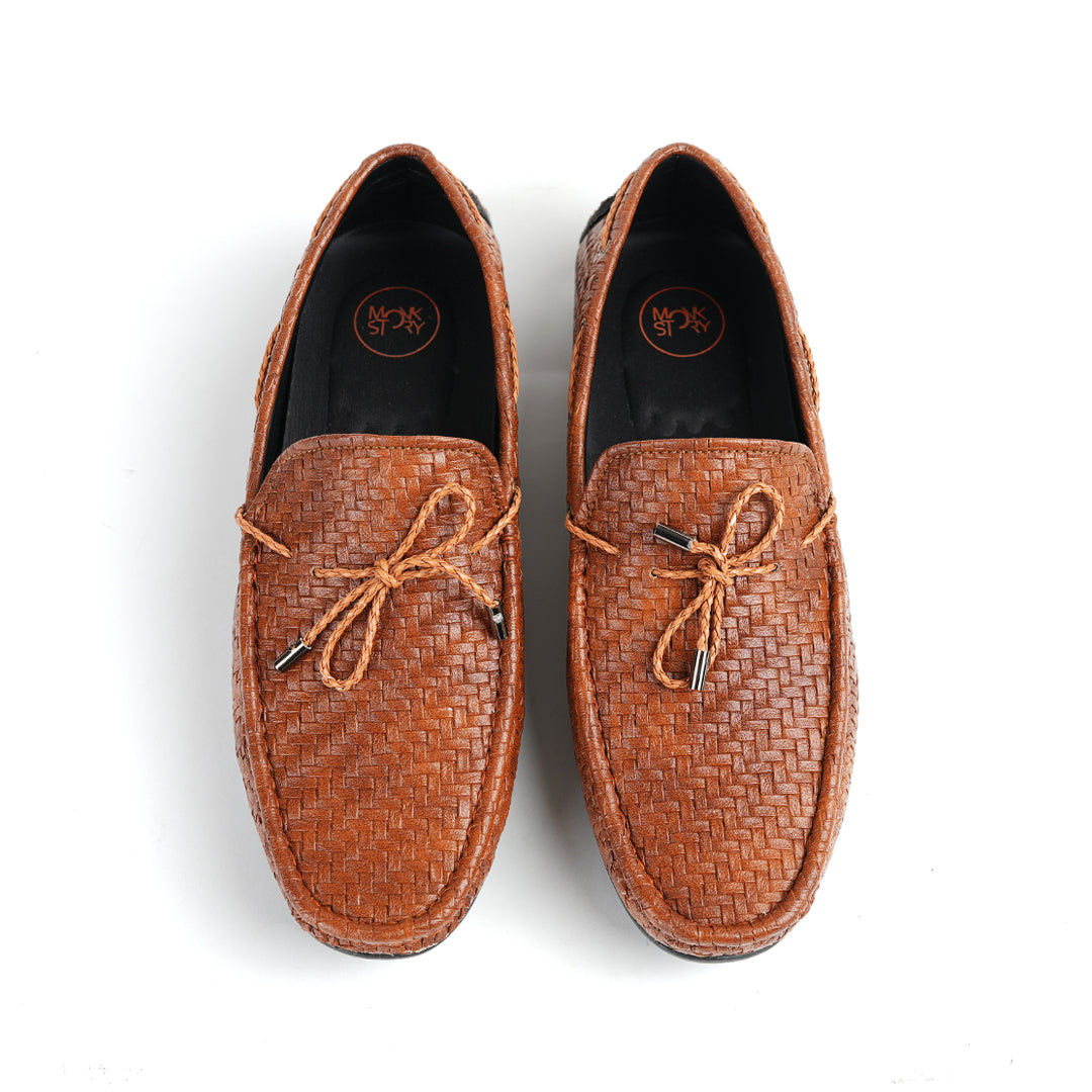 A fashionable men's Monkstory brown loafer with tassels, combining style and comfort.