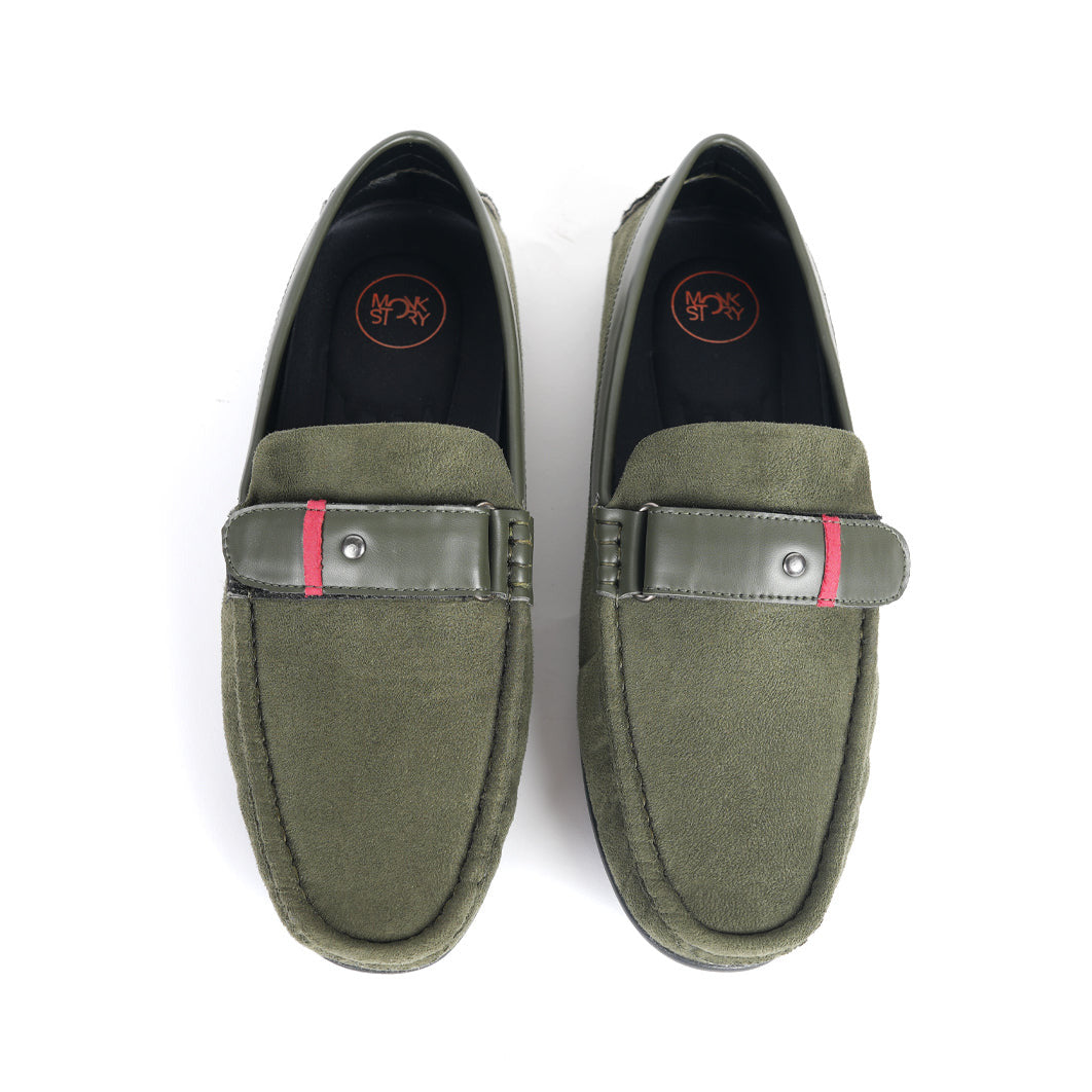 Elevate your style with these comfortable Monkstory olive green driving shoes. Crafted from luxurious suede, these men's loafers feature a striking red buckle for added flair. Perfect for any occasion.