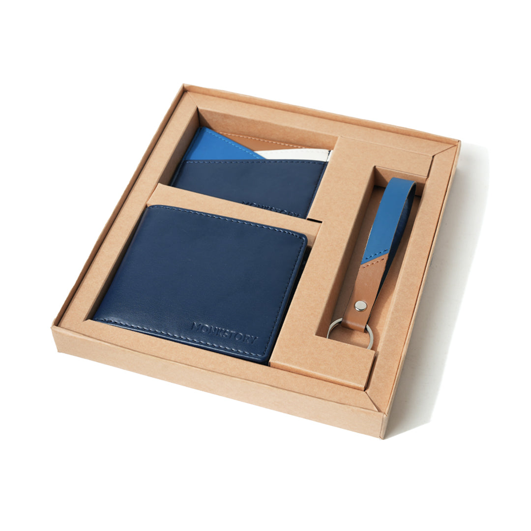 Handcrafted accessories, a blue Monkstory Signature Gift Box containing a wallet and key ring.