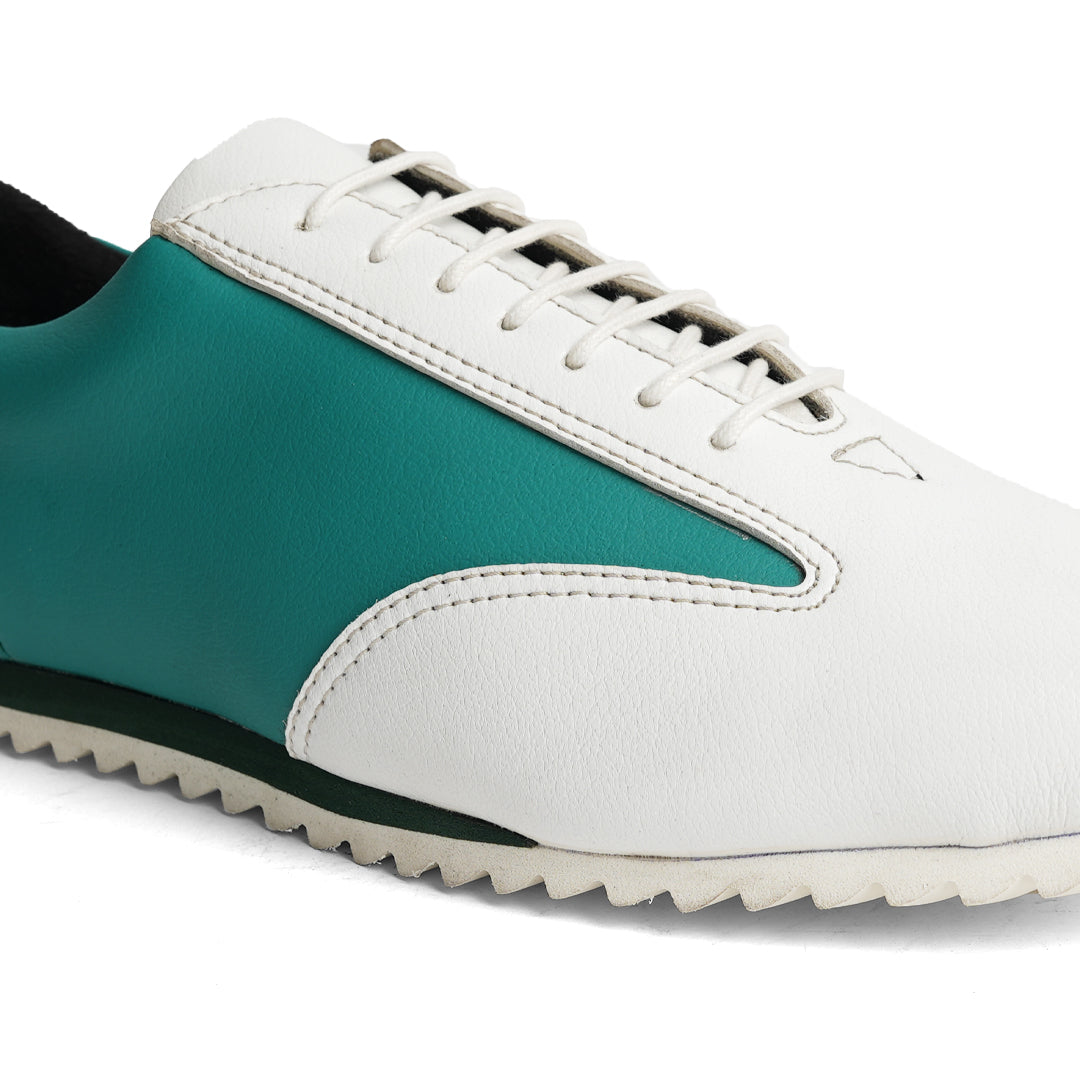 The Monkstory Dual Colour Smart Sneakers, in Teal Green & White, are a stylish and comfortable option for anyone in search of a sneaker with a white sole.