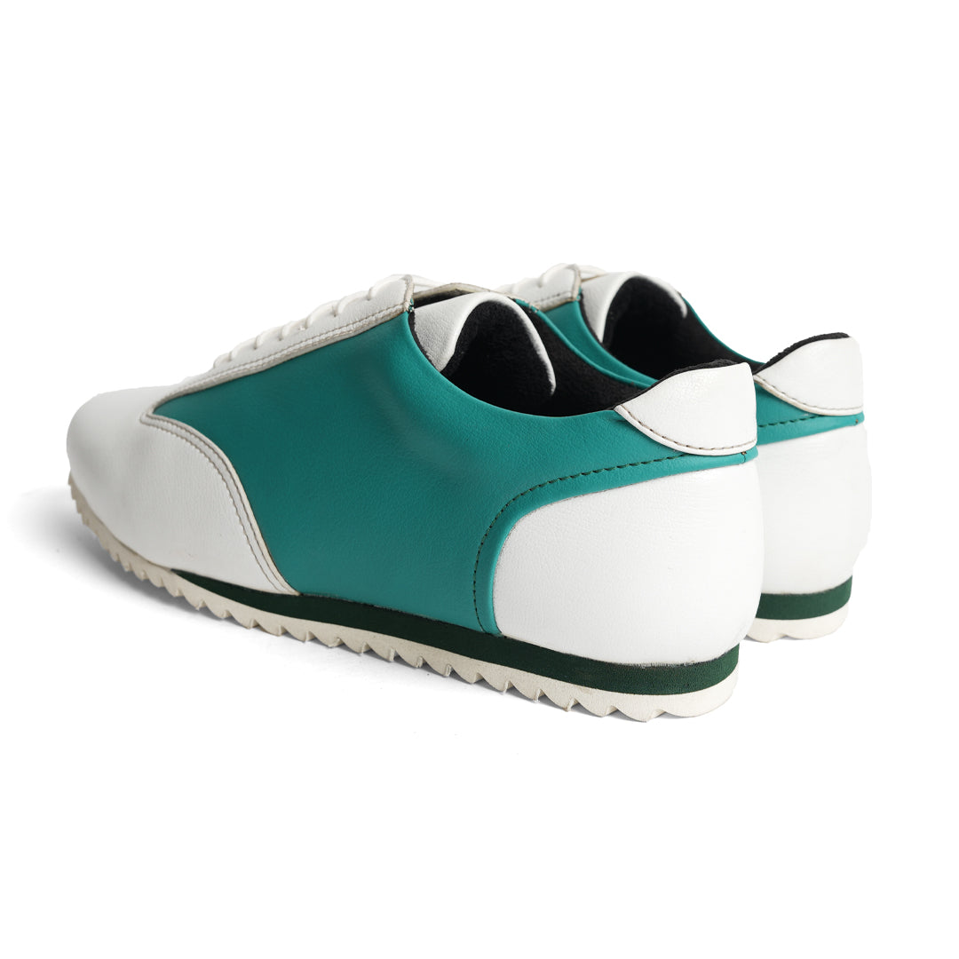 The Monkstory Dual Colour Smart Sneakers, in Teal Green & White, are a stylish and comfortable option for anyone in search of a sneaker with a white sole.