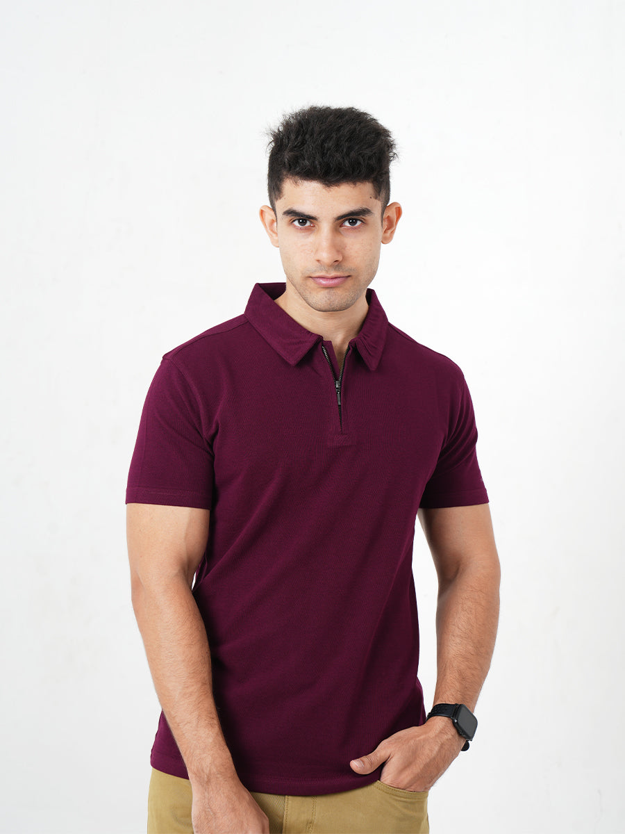 A man wearing a Monkstory Bamboo Cotton Zip-Polo Tee in Mauve Wine shade.