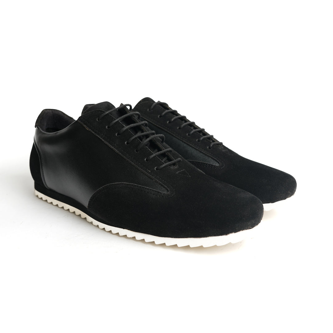 The Monkstory Black Dual-Tone Smart Sneakers combine sleek style with unparalleled comfort.