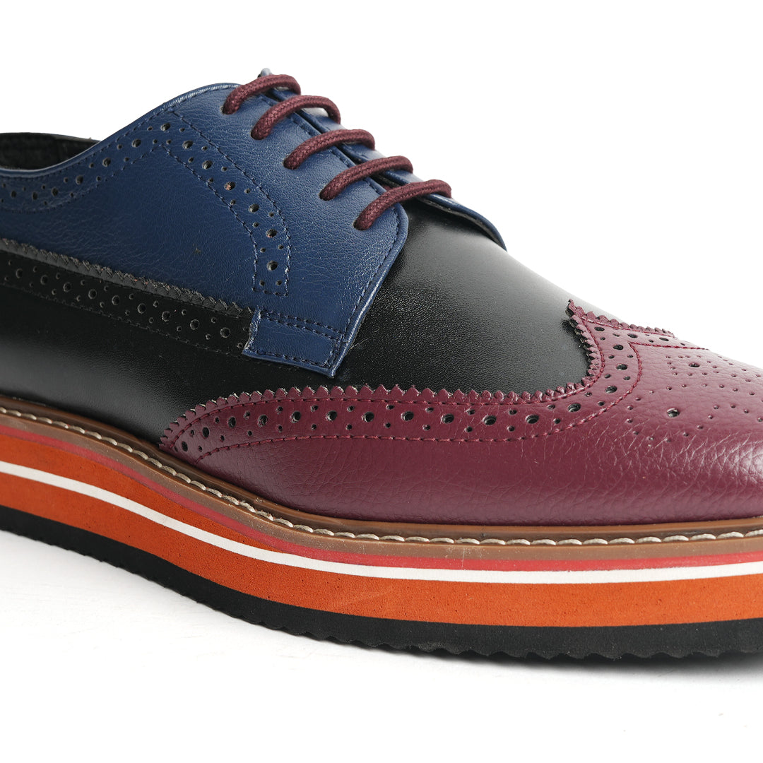 These stylish Monkstory Tricolour Brogues are men's wingtip oxford shoes with a navy blue, burgundy and black stripe. With their comfy colored sole, these head-turners are