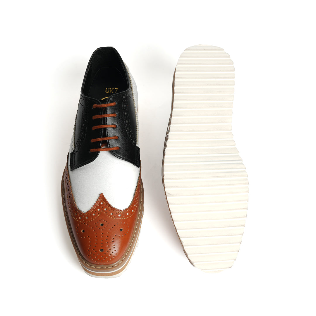 A trendy Monkstory Tricolour Brogues with a striking tricolor design.