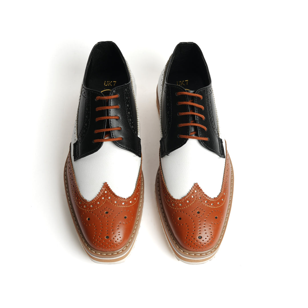 A trendy Monkstory Tricolour Brogues with a striking tricolor design.