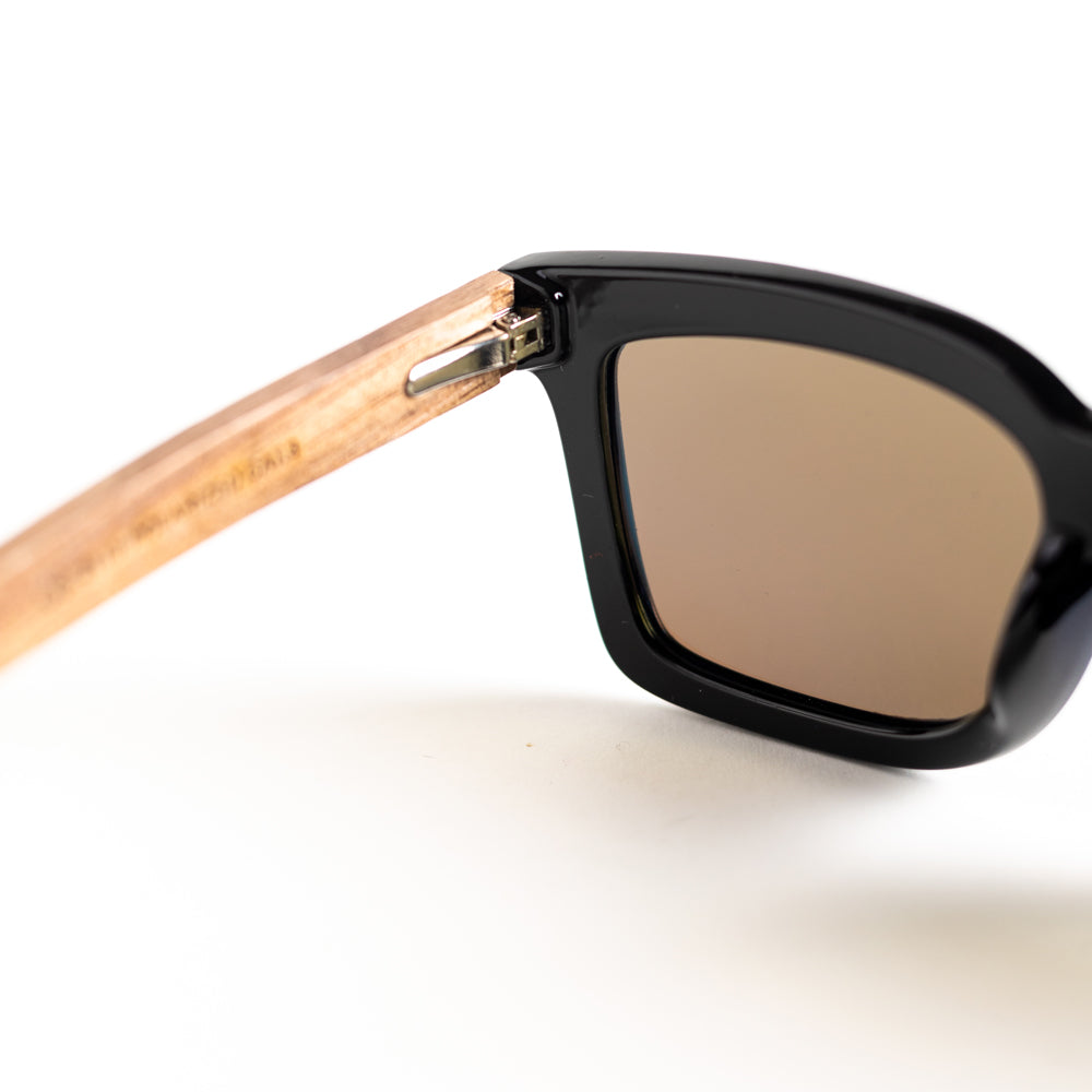A pair of monkstory sunglasses with reflective lenses on a white background.