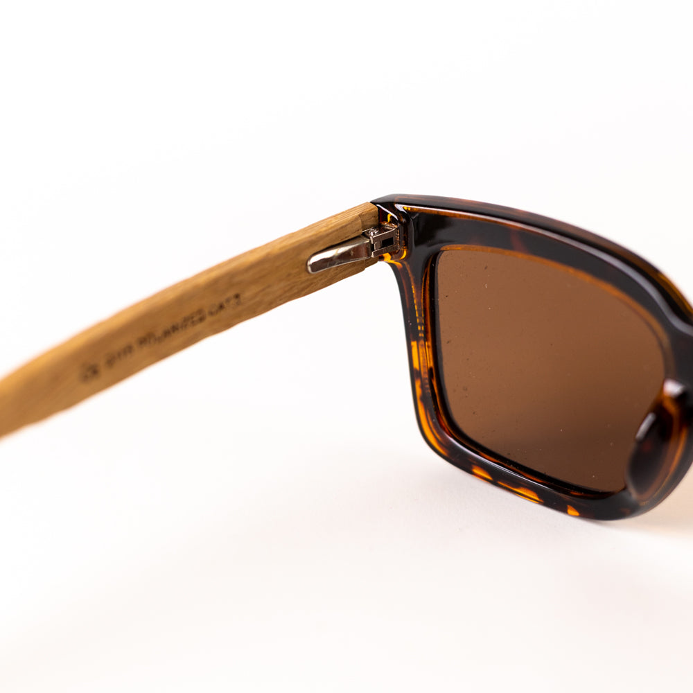 A pair of MonkStory Woody Wood+Acetate unisex sunglasses with brown lenses on a white background.