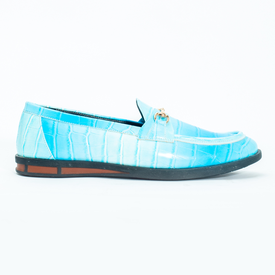 A pair of vibrant Monkstory brand Flatform Horsebit Slip Ons in powder blue crocodile skin, perfect for formal occasions.