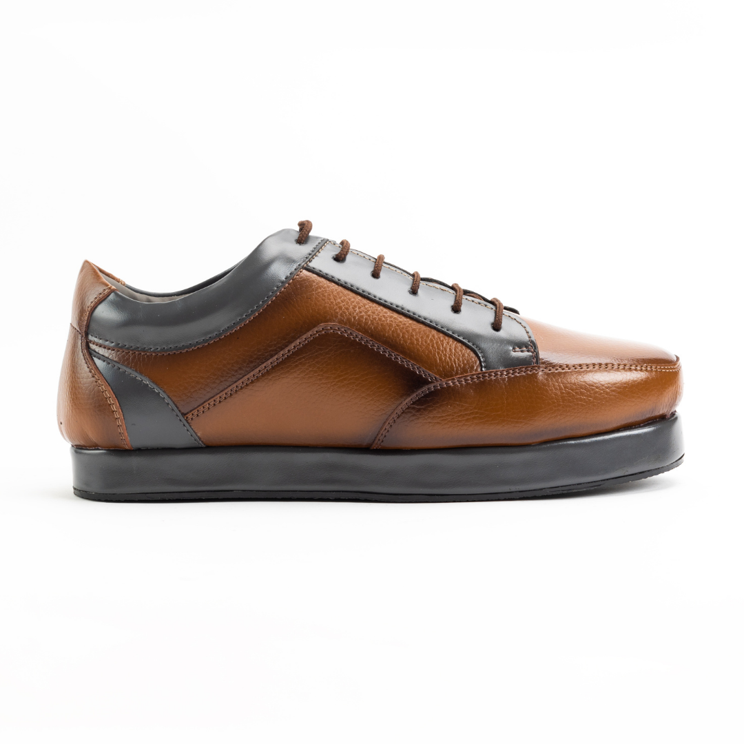 A men's brown leather shoe: Offbeat Lace Vegan Sneakers - The British Explorer by monkstory.