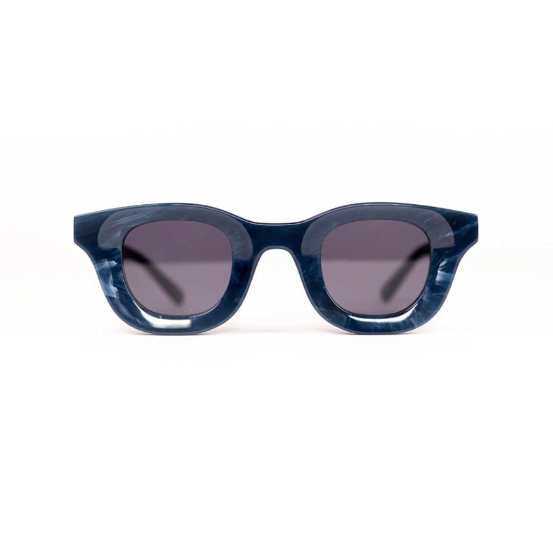 A pair of MonkStory Thick Acetate Unisex Sunglasses - Marbleous Blue on a white background.
