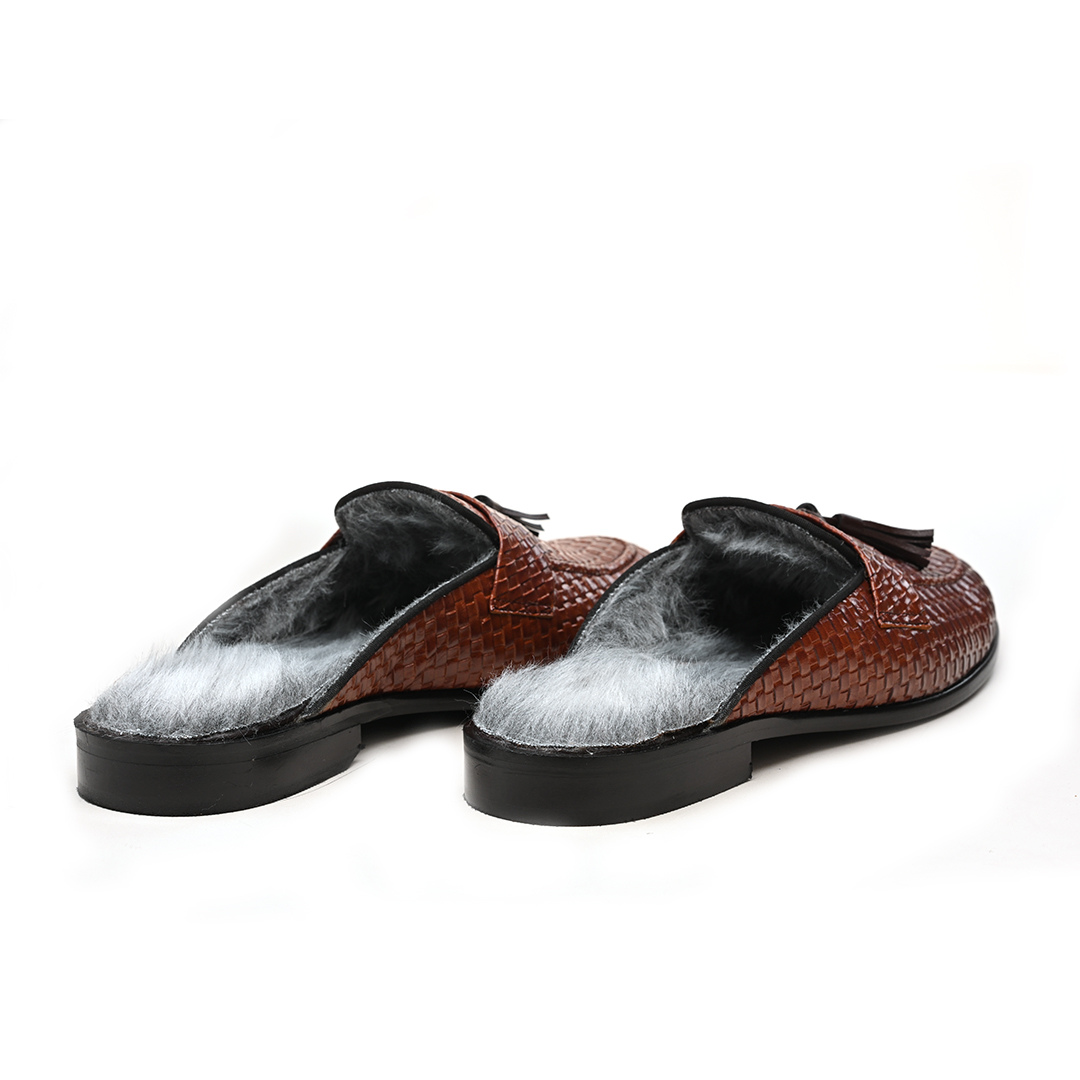 A monkstory men's high-class brown woven slipper with tassels and Luxious Mule Shoes Tan faux-fur insoles.