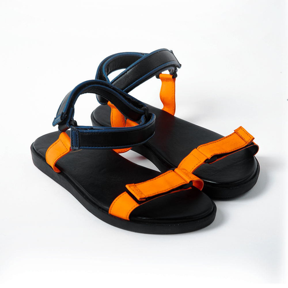 A pair of orange and black Drift Technical Sandals by Monkstory, featuring the perfect balance of streetwear style, showcased against a clean white background.