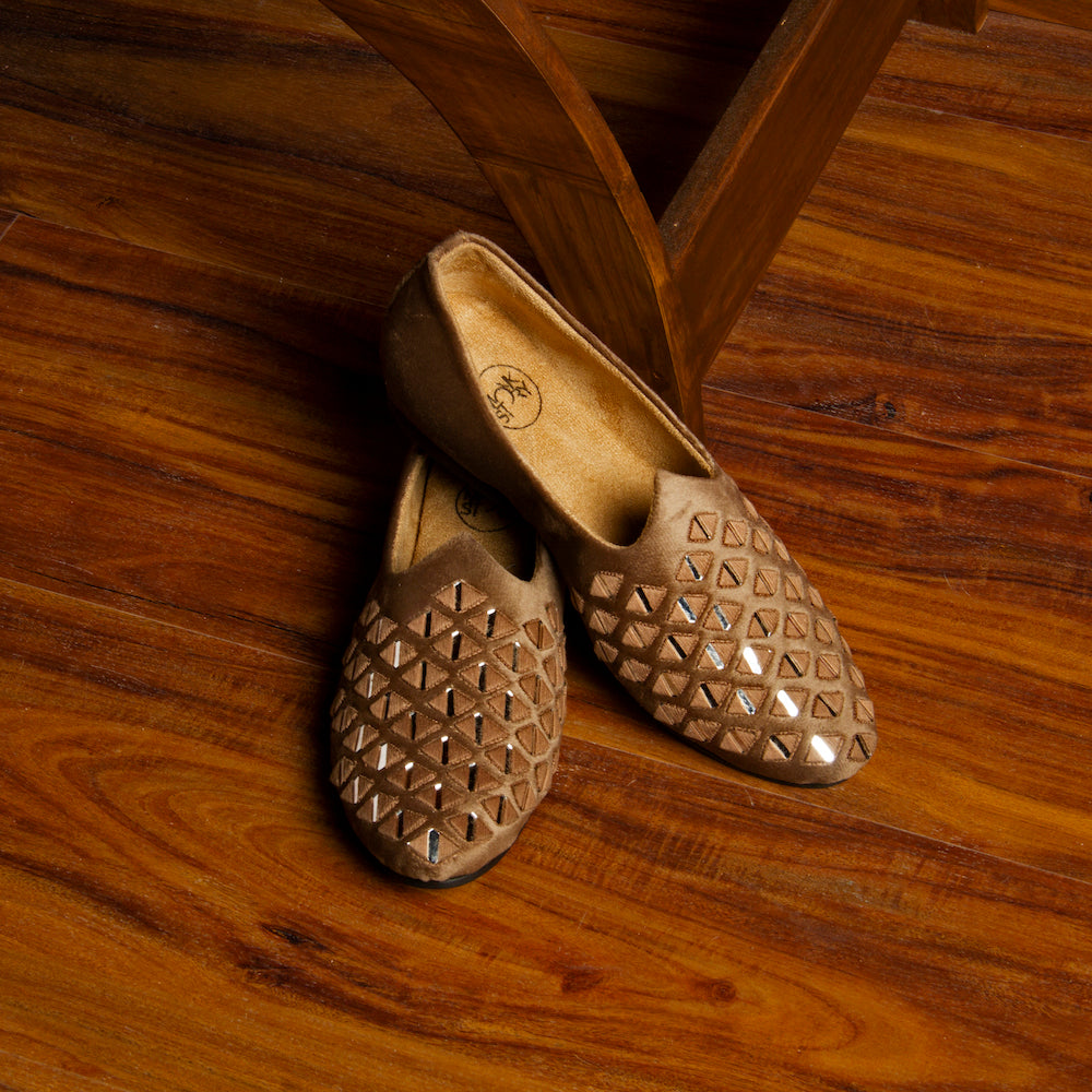 A comfortable women's brown Mirror Mojari - Royal Beige slip on shoe with a Monkstory stylish cut out design.