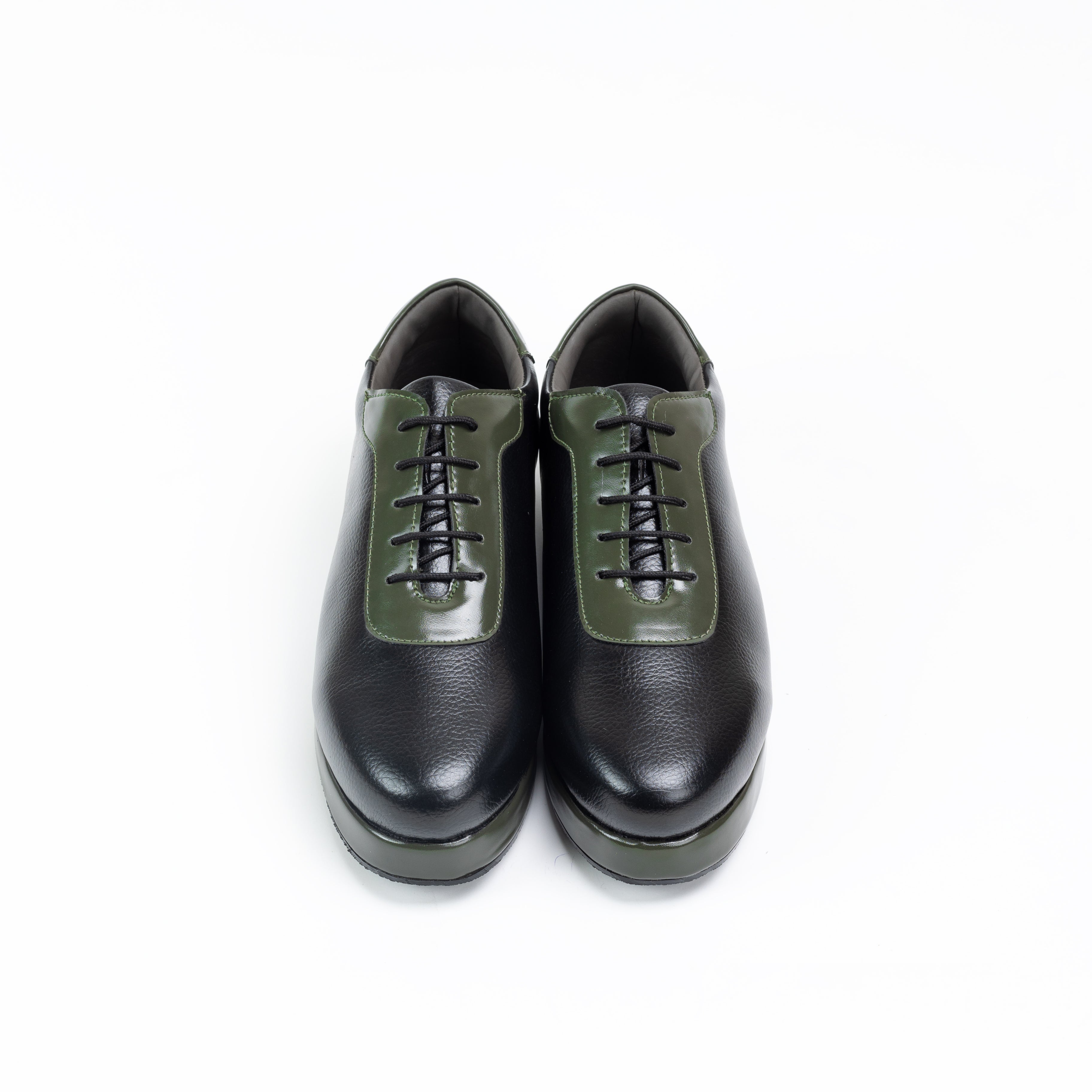 The Offbeat Lace Vegan Sneakers - The Deep Thinker by monkstory are men's black and green vegan leather sneakers on a white background.