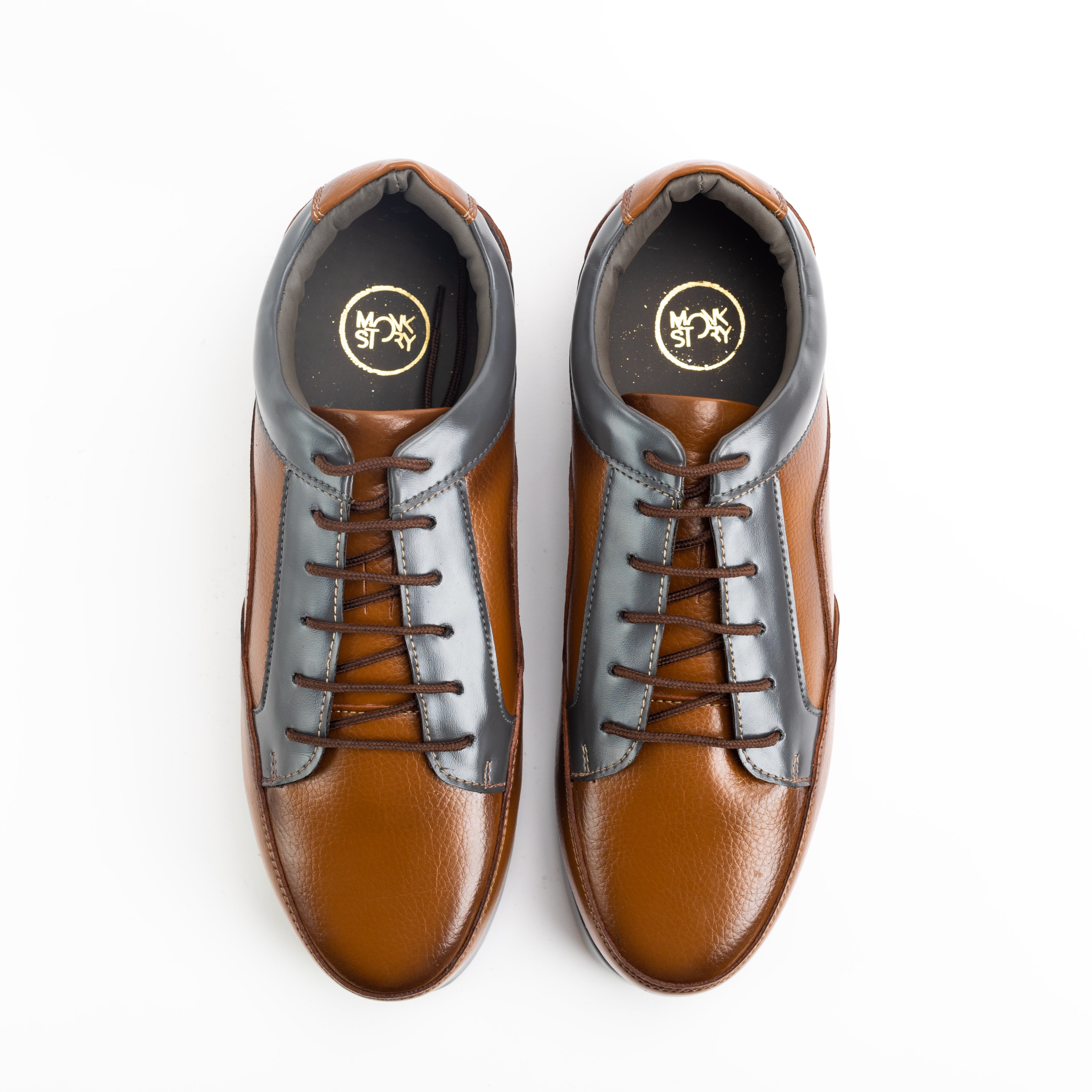 A men's brown leather shoe: Offbeat Lace Vegan Sneakers - The British Explorer by monkstory.