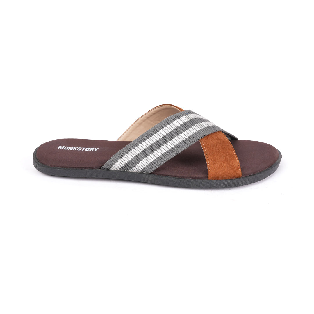 A pair of monkstory grey striped strap sandals in brown and tan.