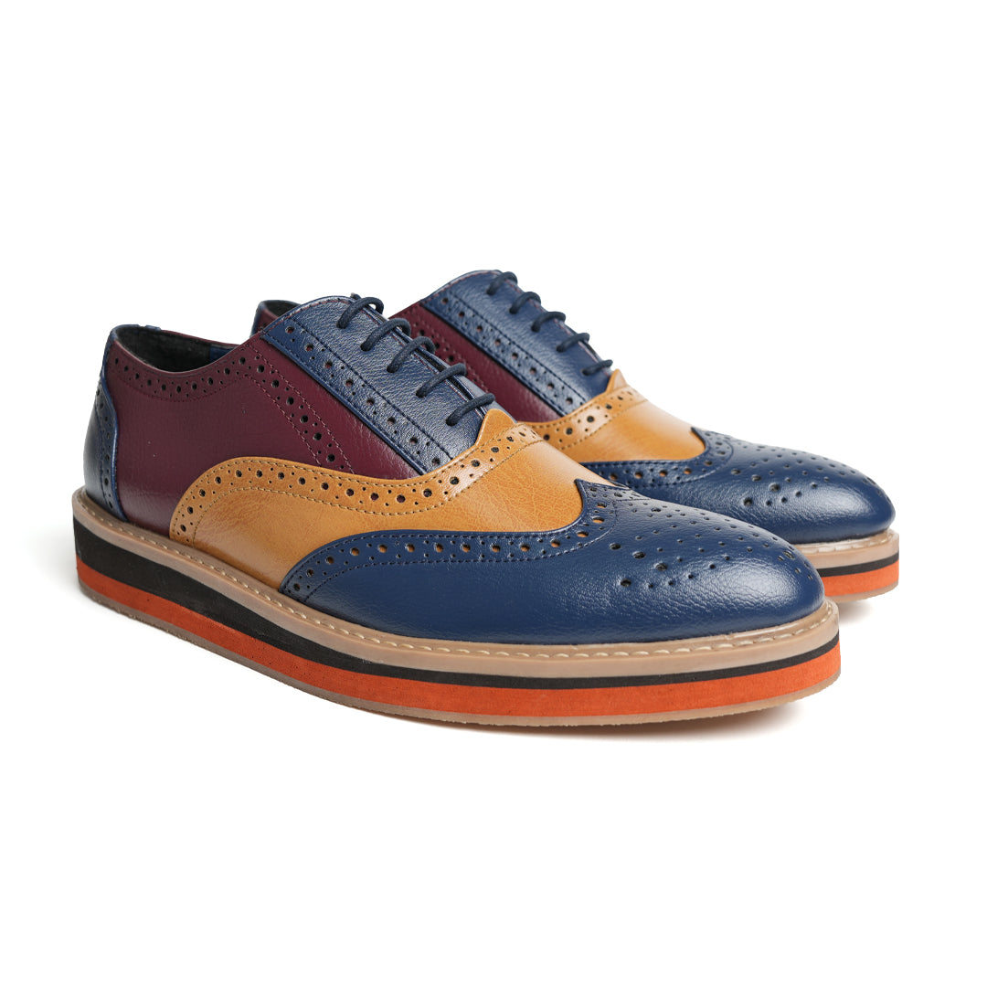 A fashion forward monkstory men's Beverly tricolour brogue in blue, red and orange.