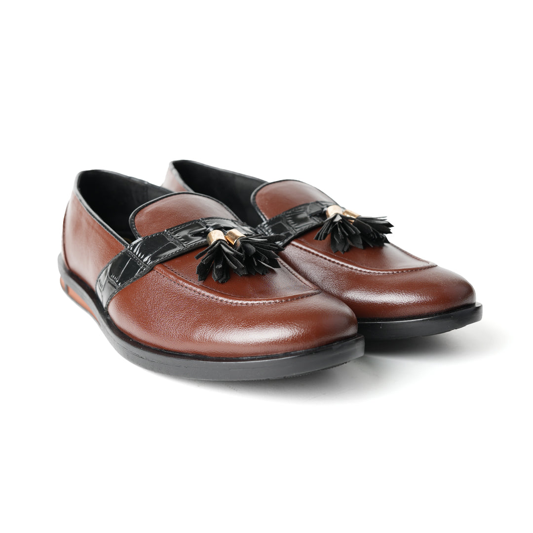 Flatform Metallic Tassel Slip Ons - Brown, by Monkstory, are a pair of loafers with faux leather.