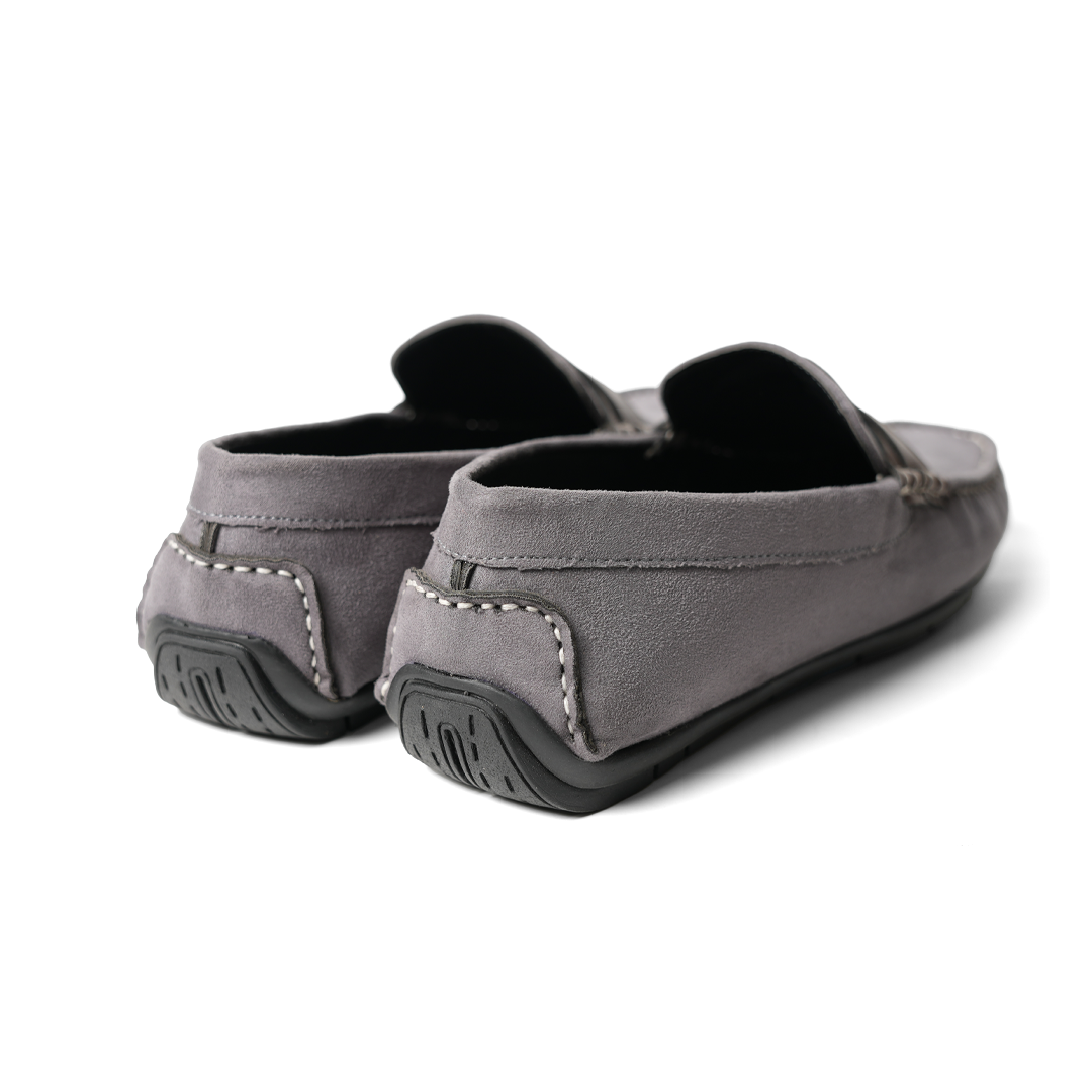 A pair of comfortable grey Stilo Driving Shoes with brown detailing, perfect for driving. Brand: MONKSTORY