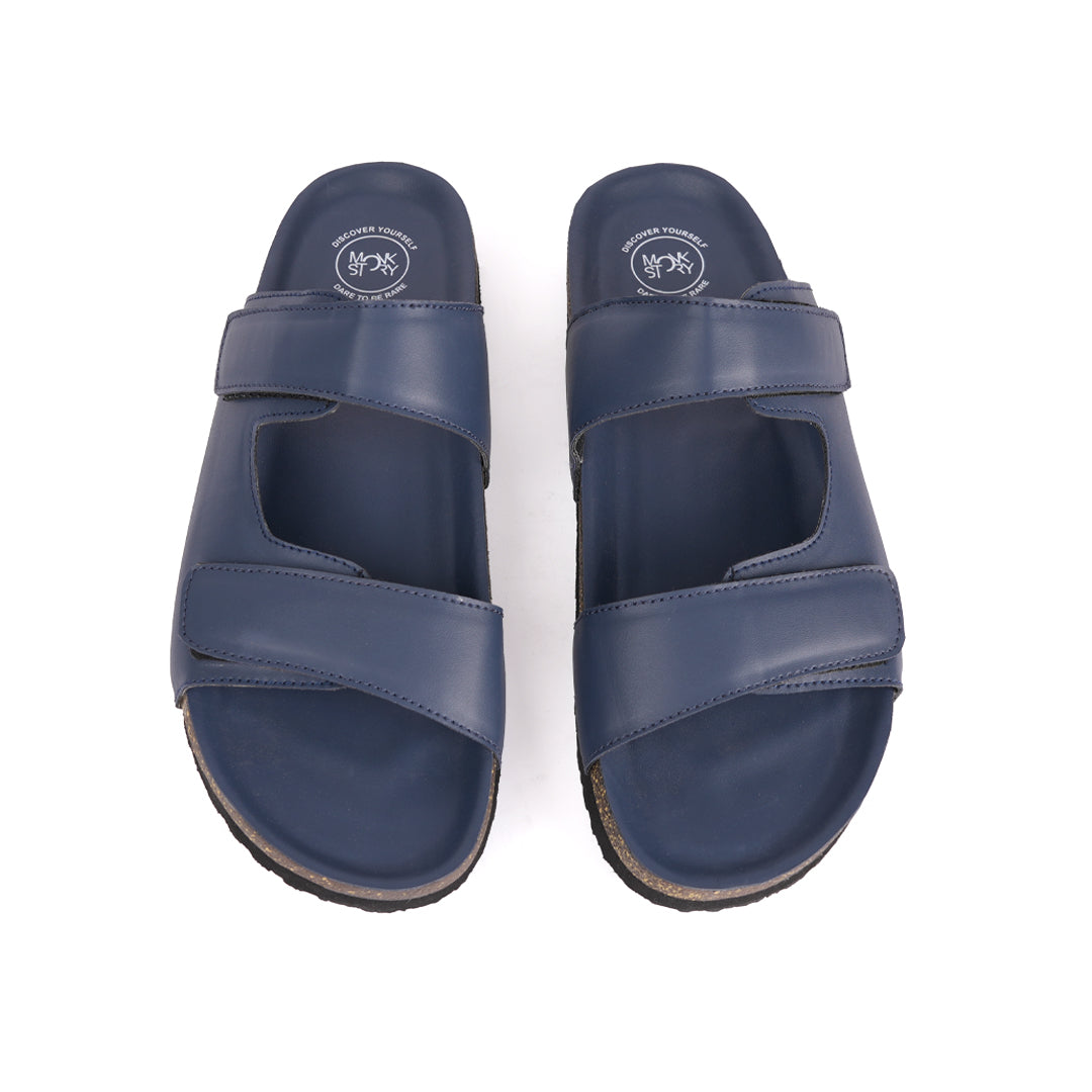 A pair of men's blue Monkstory Cork Dual-Straps sandals, made with Microfibre PU.