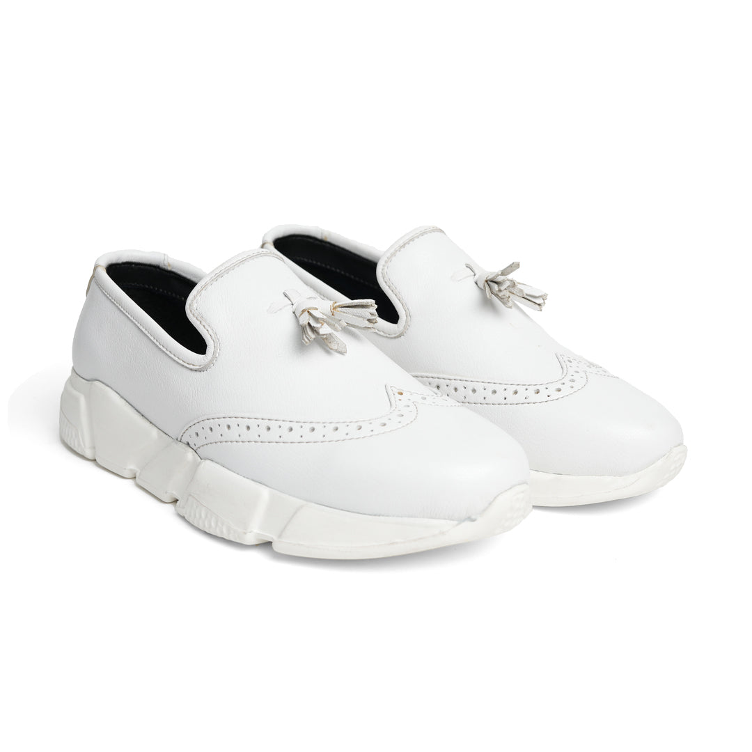 A stylish white Chunky Tassel Sneakers from monkstory.