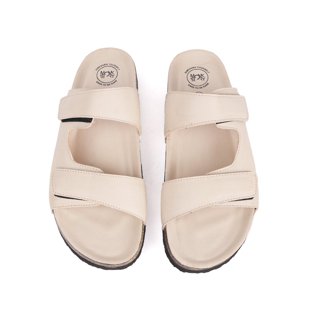 A pair of Monkstory Cork Dual-Straps Sandals - Cream on a white background.